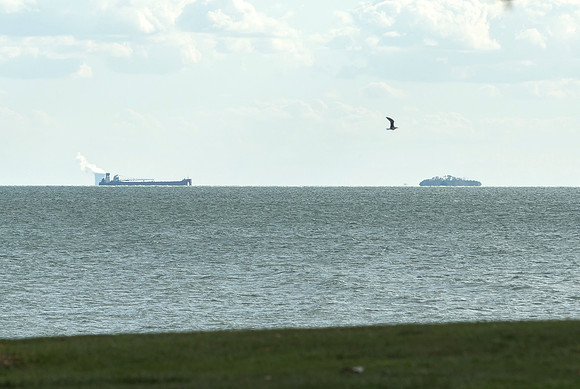 Colechester Pier north shore lake Erie looking south Middle Sister Island -Nuclear plant 10-15 ft above the wate